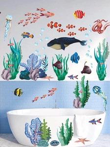 Detailed view of colorful ocean animal wall stickers applied to bathroom tiles and tub surface
