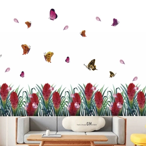 Vibrant red flower and butterfly wall decal for a modern living room interior
