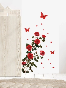 Detail of red rose wall decal with green leaves and butterflies on white living room wall