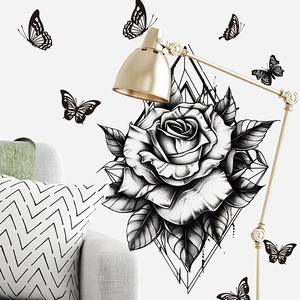 Elegant black rose wall decal with geometric triangles and butterflies for home decor