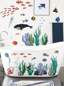Detail of colorful whale and jellyfish waterproof wall stickers on bathroom tiles and tub