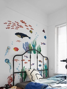 Watercolor sea whale and jellyfish wall stickers decorating a modern bedroom wall
