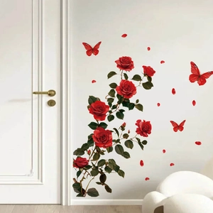 Red rose and butterfly wall stickers on white wall in a cozy modern living room