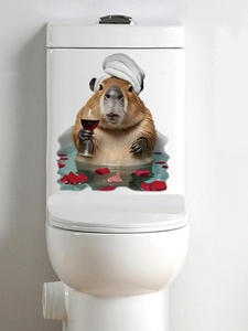 Detail of cute Capybara bathtub sticker on a white ceramic toilet tank surface