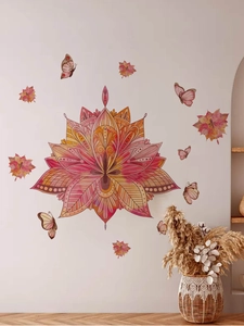 Detail of red lotus mandala wall sticker with butterflies in a warm artistic home setting