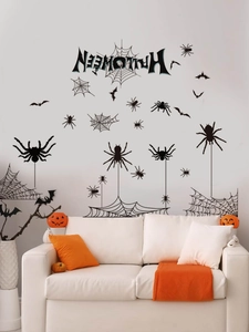Λεπτομέρεια από μαύρα αυτοκόλλητα τοίχου Halloween με ιστούς αράχνης και νυχτερίδες