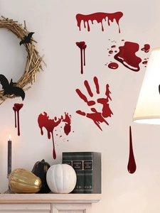 Detail view of realistic red bloody handprint wall stickers for Halloween home decoration