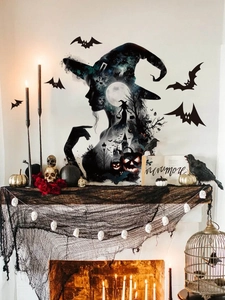 Halloween wall decals featuring a large witch silhouette with bats above a festive fireplace