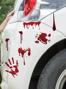 Bloody handprint and drip decals on a car bumper for spooky Halloween vehicle decoration