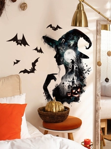 Detail of Halloween witch silhouette wall decal with castle and pumpkins in a bedroom