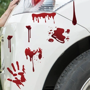 Halloween bloody handprint and blood drip decals applied on a white car body