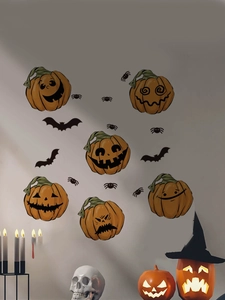 Stickers muraux Halloween avec citrouilles, chauves-souris et araignées sur mur gris