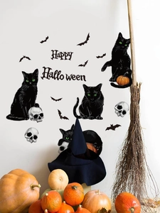 Halloween wall decals with black cats, bats, and skulls set against a white wall background