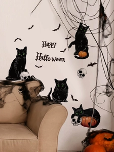Detail showing Happy Halloween wall stickers with black cats and bats on white wall