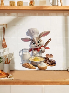 Detail of cartoon rabbit chef wall sticker applied on white kitchen tiles for bakery decor