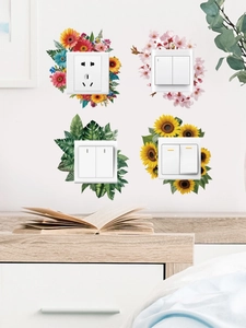 Detail of four PVC wall stickers with floral and leaf patterns for home light switches