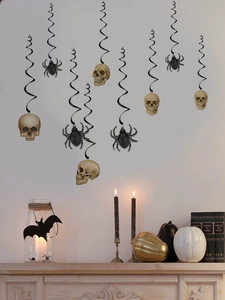 Detail of Halloween ceiling hanging decorations with realistic skulls and black spiders