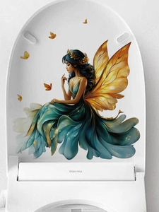Détail d'un sticker mural fée dorée sur surface blanche avec des papillons orange