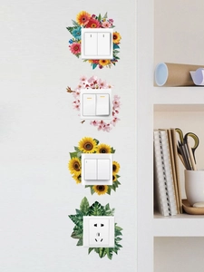 Detail view showing floral PVC stickers on light switches for home wall decor