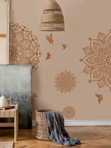Detail of brown mandala and butterfly PVC wall stickers in a cozy home interior