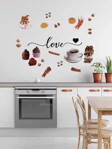 Macro detail of kitchen wall decal with coffee motifs and The secret ingredient is love text
