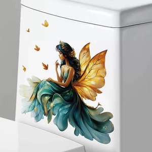 Sticker mural fée papillon élégante avec robe à franges bleue pour déco chambre