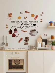 Detail of kitchen wall sticker with food icons and 'The Secret Ingredient Is Always Love' text