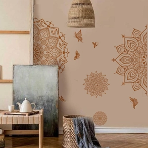 Bohemian gold mandala and butterfly wall stickers in a cozy home living room setting