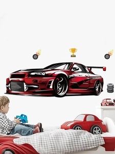 Close-up of red race car wall sticker with winner trophy in a boy's bedroom decor