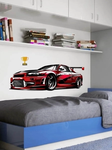 Detail of red sports car wall decal and winner trophy for kids' bedroom decor