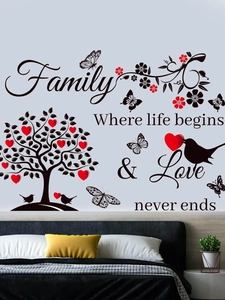 Détail d'autocollant mural arbre généalogique noir avec cœurs rouges dans une chambre