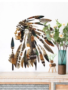 Detail showing an ethnic Indian man wall sticker with feather textures on a white wall