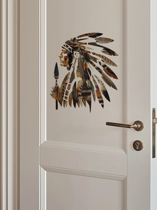Detail of creative native chief wall sticker with colorful feathers on a white room door