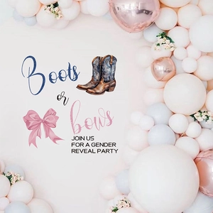 Gender reveal party wall decal with boots and bows design surrounded by balloon arch