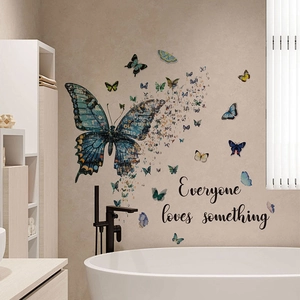 Blue butterfly wall stickers with Everyone Loves Something quote for home decor