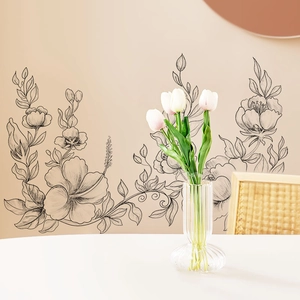 Minimalist black line art flower wall stickers in PVC for a modern home living room decor