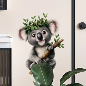 Self-adhesive PVC wall sticker featuring a cute cartoon koala with a green leaf crown