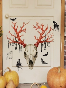 Detail of Halloween deer skull wall sticker with red antlers and black bats on white door