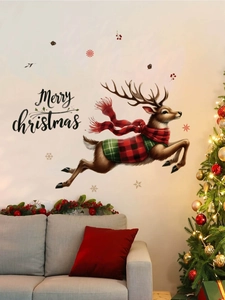 Detail showing leaping Christmas reindeer wall sticker with Merry Christmas text on a white wall
