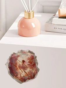 Detailed view of pink fairy 3D wall sticker with floral design on minimalist cabinet