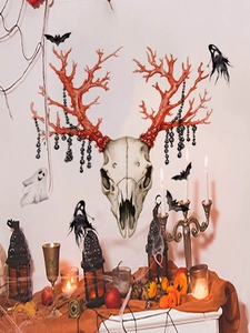 Close-up of Halloween deer skull wall sticker with red antlers and gothic decor