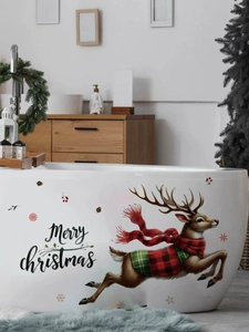 Detail of Christmas reindeer wall sticker with Merry Christmas text on a white bathtub