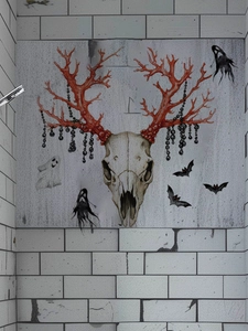 Macro detail of Halloween ram skull wall decal with red horns and black bead chains