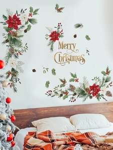 Dettaglio di adesivi murali natalizi con stelle di Natale e scritte in camera da letto