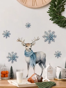 Détail du sticker mural de Noël avec renne bleu aquarelle et flocons de neige