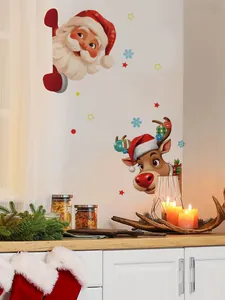 Détails des stickers muraux de Noël avec Père Noël et renne sur un mur blanc