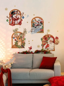 Close-up of PVC Christmas wall decals featuring Santa, snowman, and reindeer characters