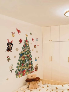 Christmas wall decal set with tree and dachshund in a cozy bedroom setting