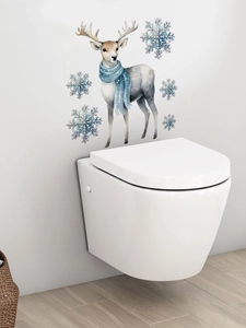 Détail de stickers muraux renne bleu et flocons aquarelle dans un intérieur minimaliste
