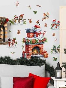 Detail of Christmas wall stickers with snowman and fireplace on a living room wall